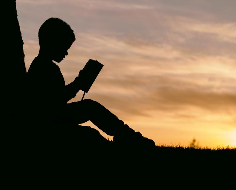 child reading a book