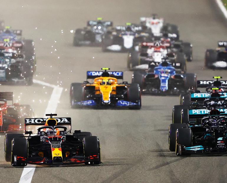 Brief description of Formula One in a photo : where 20 drivers would race against each other for a win, for a championship. 