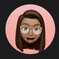 Animated gif of my Animoji -brown haired, green eyed girl-