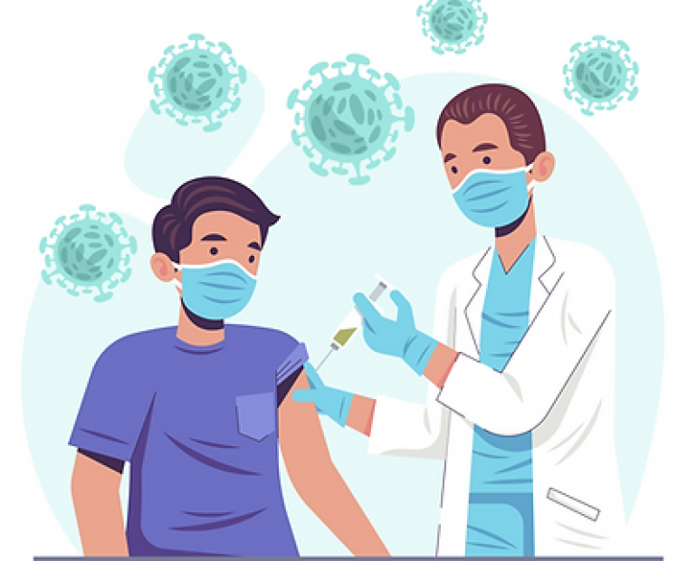 A man getting vaccinated by a healthcare person